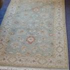 Green & cream rug