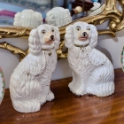Pair of white Staffordshire dogs