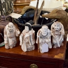 Set of 4 carved bone figurines