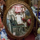 Oval gold mirror